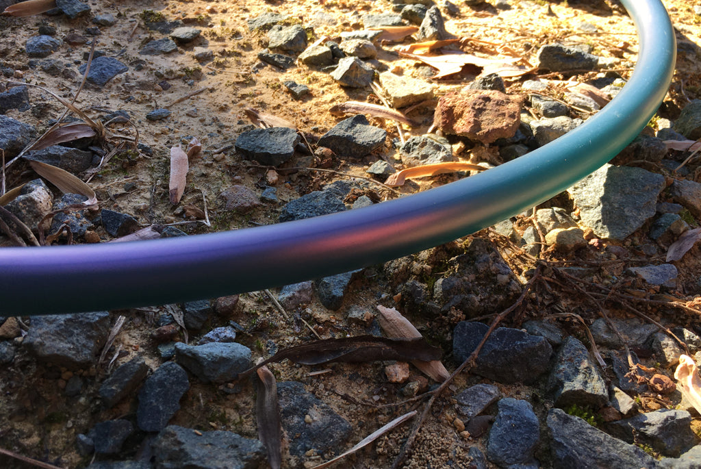 World class polypro & HDPE hula hoops. Custom sizes, colors, material, grips, sectionals & more. Bare hoop pictured is Kalypso color shift.