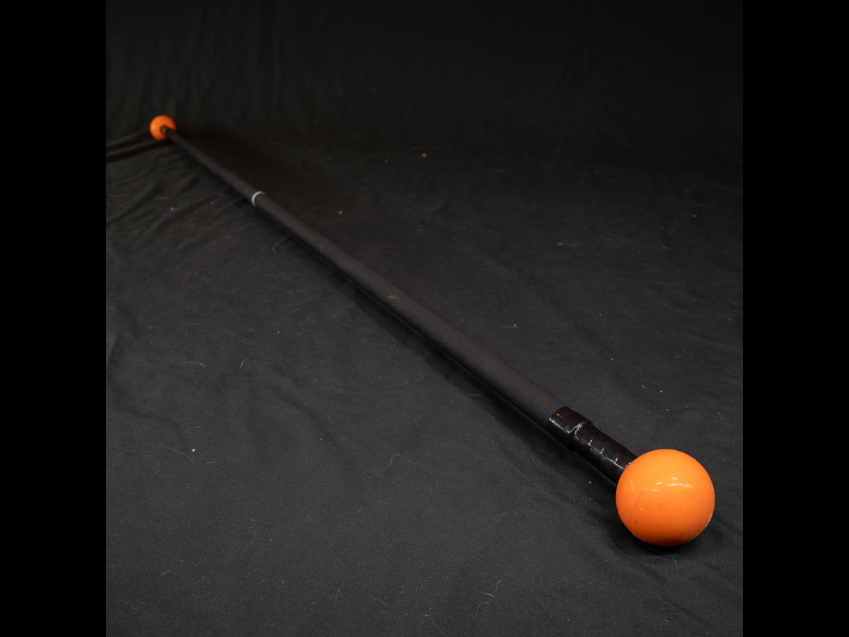 Unbreakable acro staff / acrobatics pole made of carbon fiber, wrapped with a durable textured grip and finished with rubber ends.  Designed to be the perfect hybrid for contact manipulation and acrobatics.
